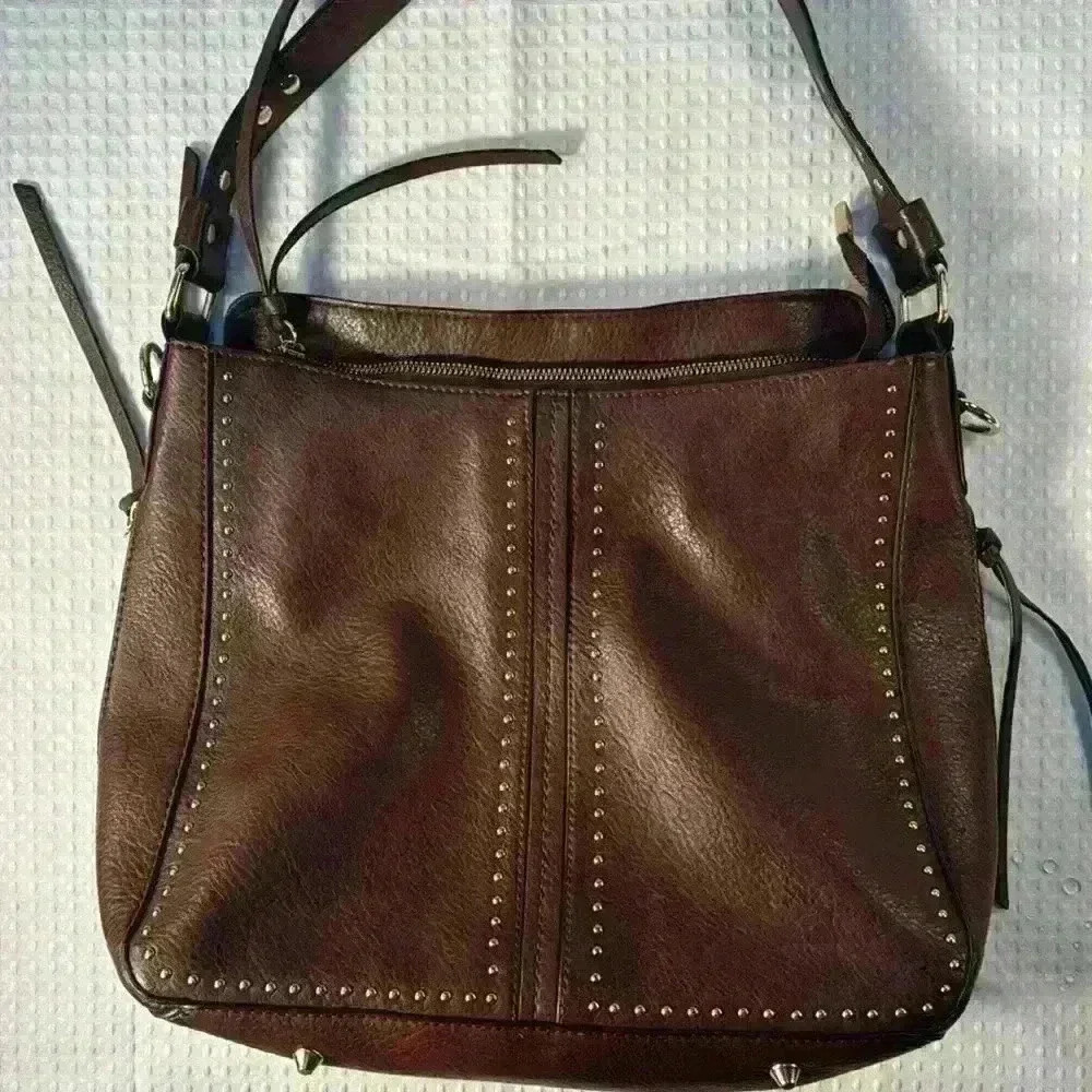 Like new, Montana West leather purse with gold detail.  Buttery soft leather.
